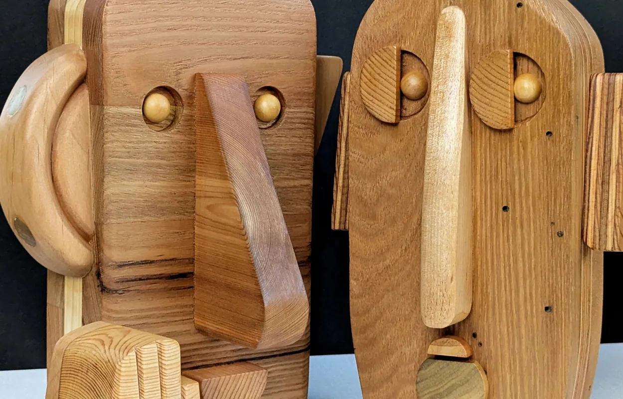 Two FACES with hand having a conversation